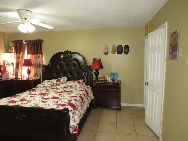 5055 Sunbury Dr, Beaumont, TX 77707 - bedroom featuring light tile patterned flooring and a ceiling fan