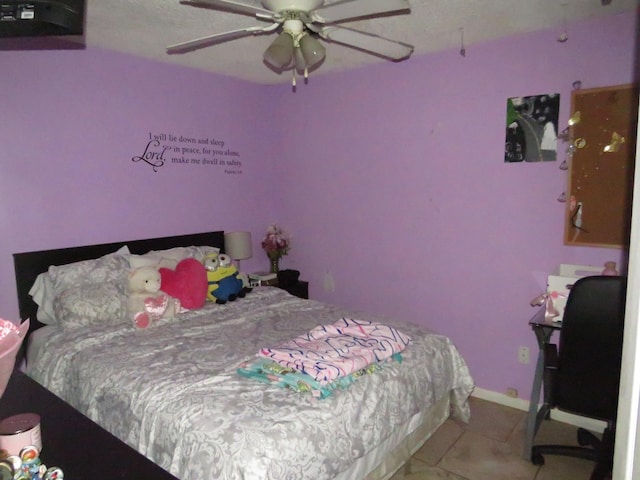 5055 Sunbury Dr, Beaumont, TX 77707 - bedroom featuring light tile patterned floors and ceiling fan