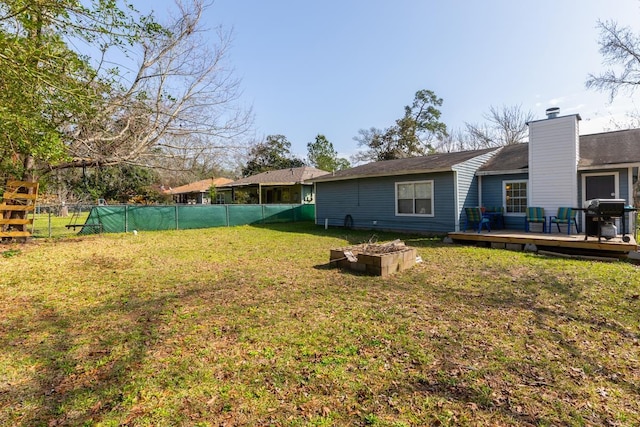 view of yard with a deck