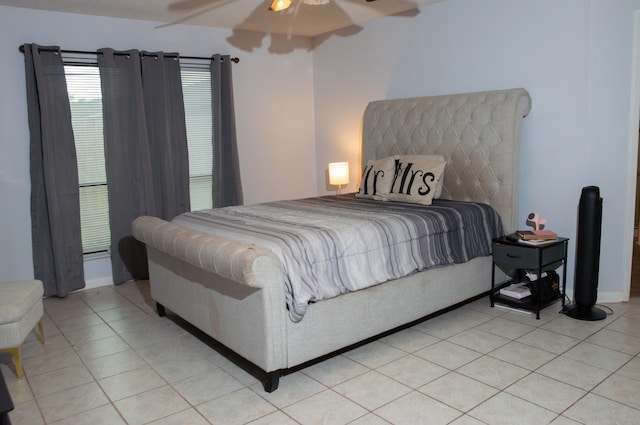 bedroom featuring light tile patterned floors