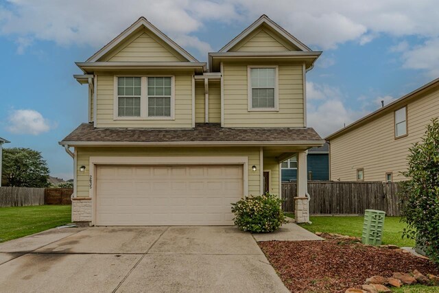 2635 Quiet Corral Ln, Port Arthur, TX 77640 - view of front of house featuring a garage, concrete driveway, and a shingled roof