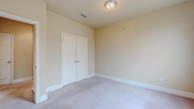 2635 Quiet Corral Ln, Port Arthur, TX 77640 - unfurnished bedroom with carpet, a closet, and baseboards