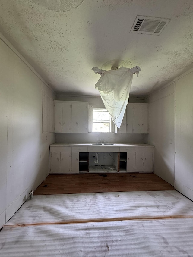 kitchen with white cabinets