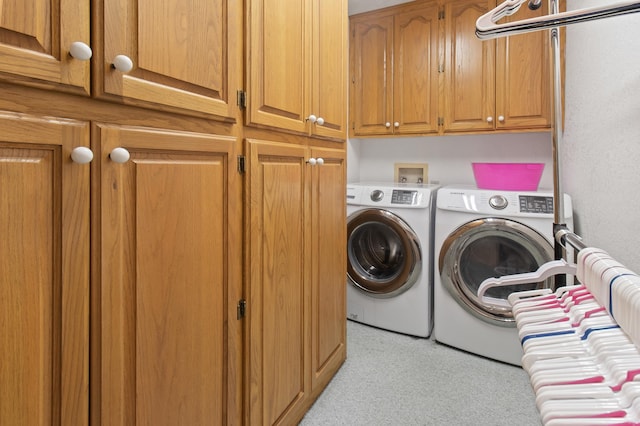 304 Whipoorwill Dr, Silsbee, TX 77656 - washroom with cabinet space, washing machine and dryer, and light colored carpet