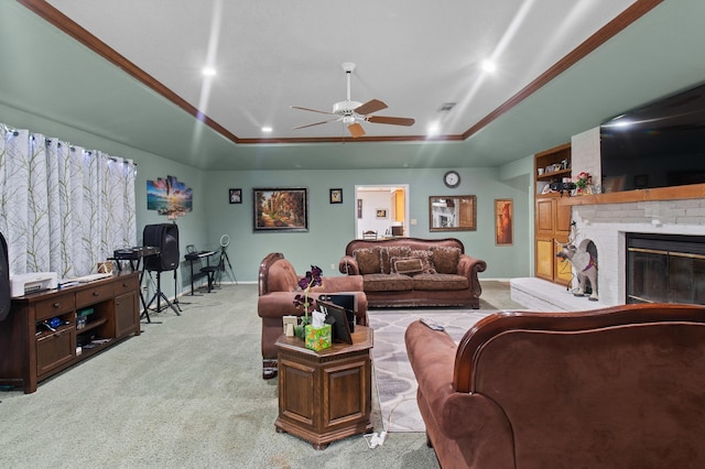 304 Whipoorwill Dr, Silsbee, TX 77656 - living area featuring carpet floors, ceiling fan, a tray ceiling, baseboards, and ornamental molding