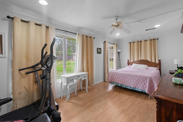 304 Whipoorwill Dr, Silsbee, TX 77656 - bedroom with crown molding, light wood-type flooring, ceiling fan, and recessed lighting