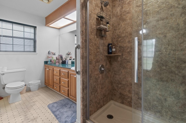 304 Whipoorwill Dr, Silsbee, TX 77656 - bathroom with toilet, a stall shower, and vanity