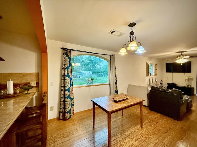 2940 36th St, Port Arthur, TX 77642 - dining room with wood finished floors and ceiling fan