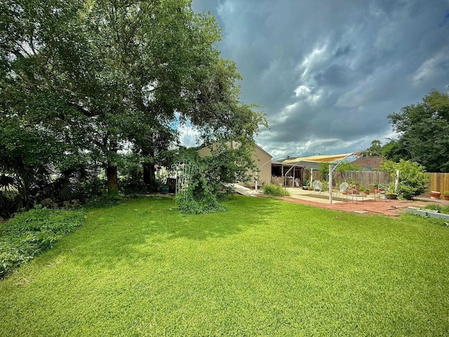 2940 36th St, Port Arthur, TX 77642 - view of yard with a patio area