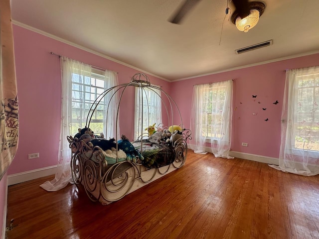 misc room featuring crown molding and hardwood / wood-style floors