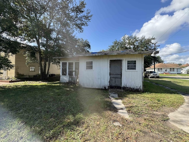 view of front of home with a front yard