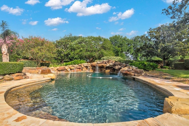 view of pool featuring pool water feature