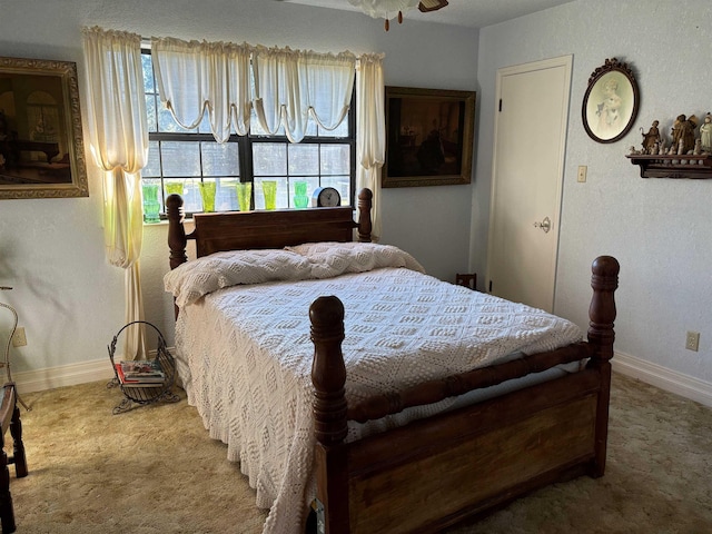 bedroom with carpet flooring and ceiling fan