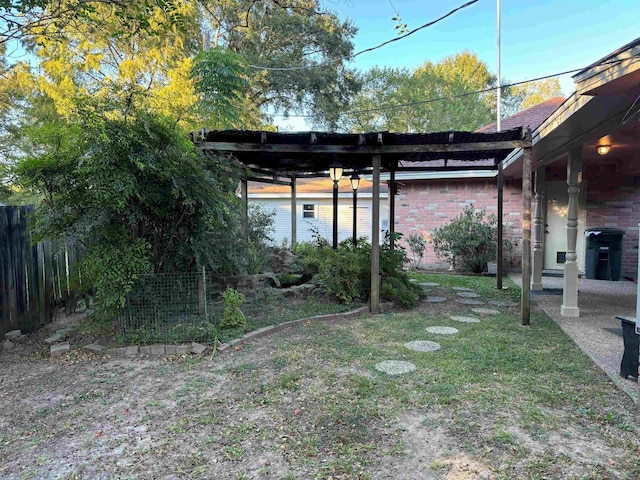 view of yard with a pergola