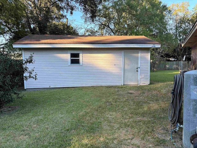 view of outdoor structure with a yard