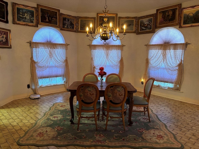 dining room featuring a chandelier