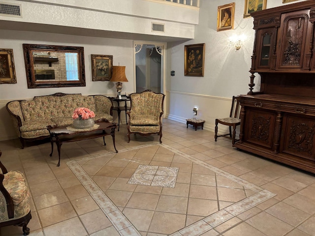 living room featuring light tile patterned floors