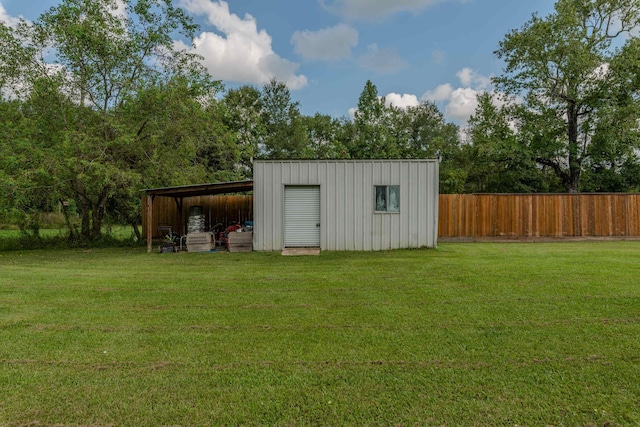 view of outdoor structure featuring a yard