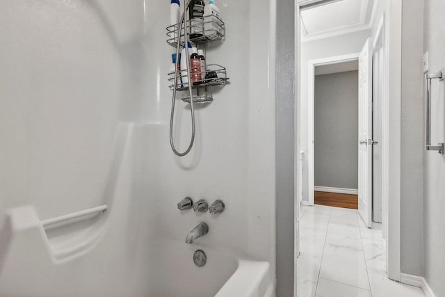 bathroom with shower / washtub combination