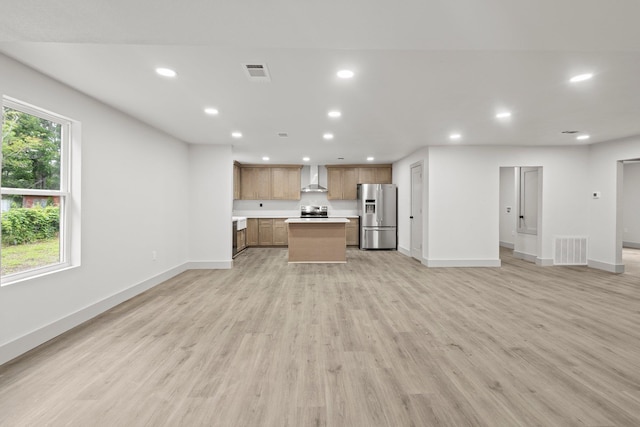 3266 Brent Dr, Orange, TX 77632 - unfurnished living room with recessed lighting, baseboards, and light wood-type flooring