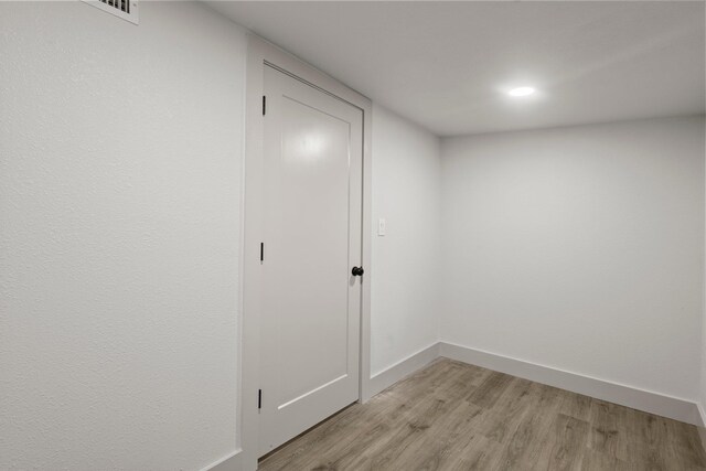 3266 Brent Dr, Orange, TX 77632 - empty room featuring light wood-style flooring, baseboards, and recessed lighting