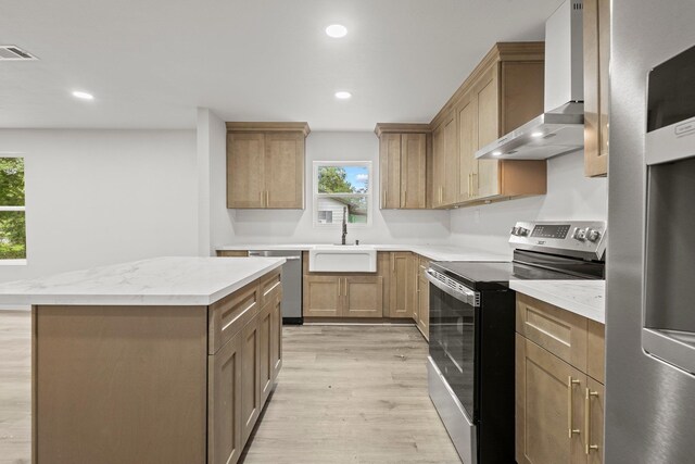 3266 Brent Dr, Orange, TX 77632 - kitchen with stainless steel appliances, wall chimney range hood, a sink, plenty of natural light, and recessed lighting