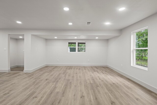 3266 Brent Dr, Orange, TX 77632 - empty room with recessed lighting, light wood-type flooring, baseboards, and plenty of natural light
