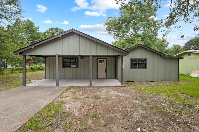 3266 Brent Dr, Orange, TX 77632 - view of front of home with a carport and concrete driveway