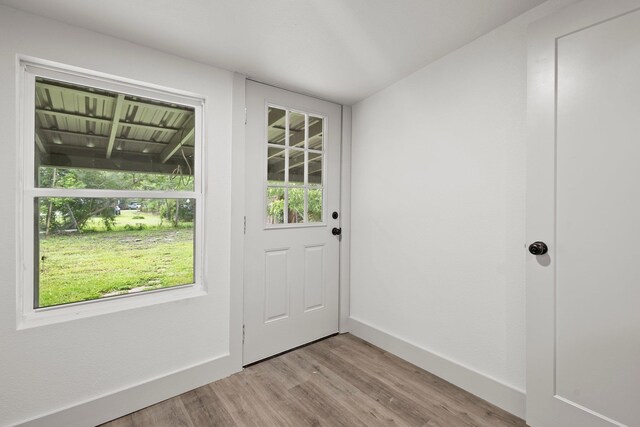 3266 Brent Dr, Orange, TX 77632 - entryway featuring light wood-style floors, plenty of natural light, and baseboards