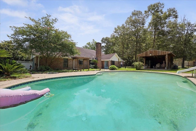 100 Teakwood St, Silsbee, TX 77656 - view of pool with a water slide