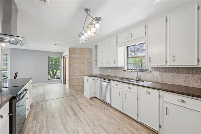 100 Teakwood St, Silsbee, TX 77656 - kitchen featuring dishwasher, plenty of natural light, black electric range, and wall chimney exhaust hood