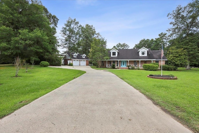 100 Teakwood St, Silsbee, TX 77656 - cape cod home with driveway, a garage, and a front yard