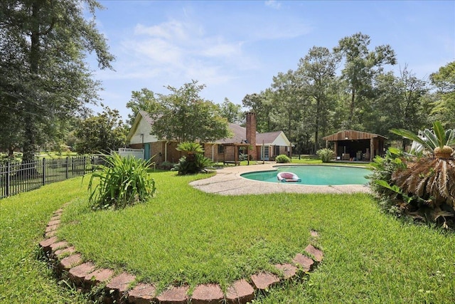 100 Teakwood St, Silsbee, TX 77656 - view of yard featuring a patio area
