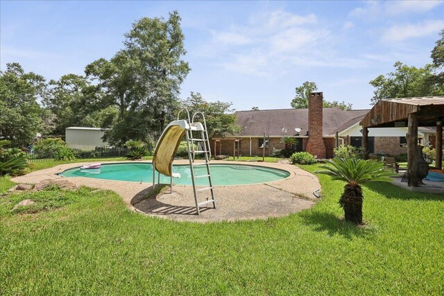 100 Teakwood St, Silsbee, TX 77656 - view of pool featuring a water slide