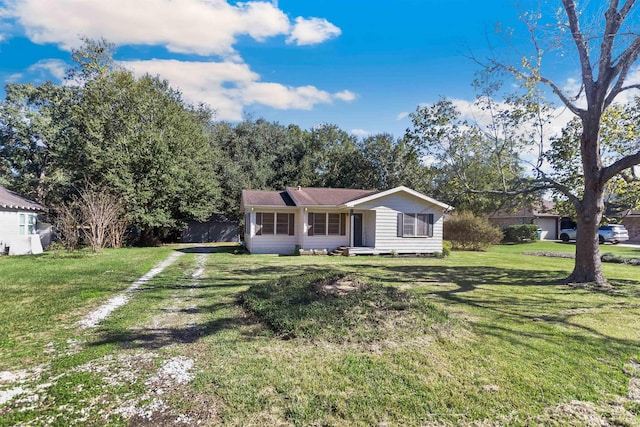 ranch-style house with a front yard