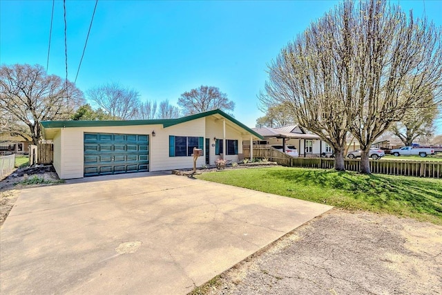 ranch-style house with driveway, a front yard, a garage, and fence