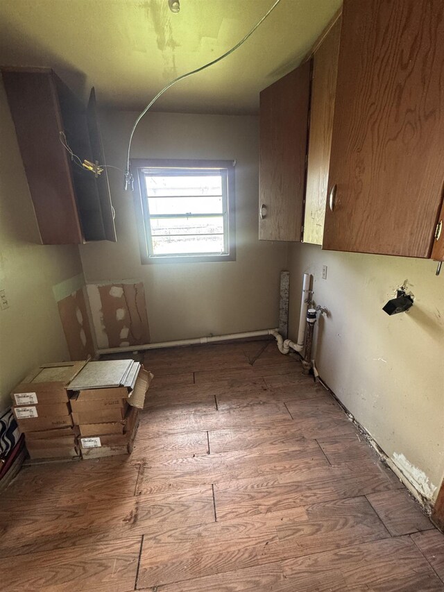 2595 Beech St, Beaumont, TX 77702 - laundry room featuring wood finished floors