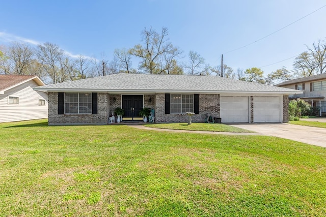 single story home featuring a front yard, a garage, brick siding, and driveway