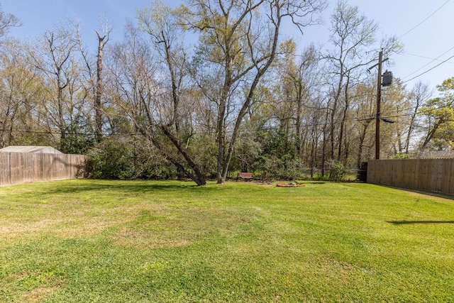 view of yard featuring fence