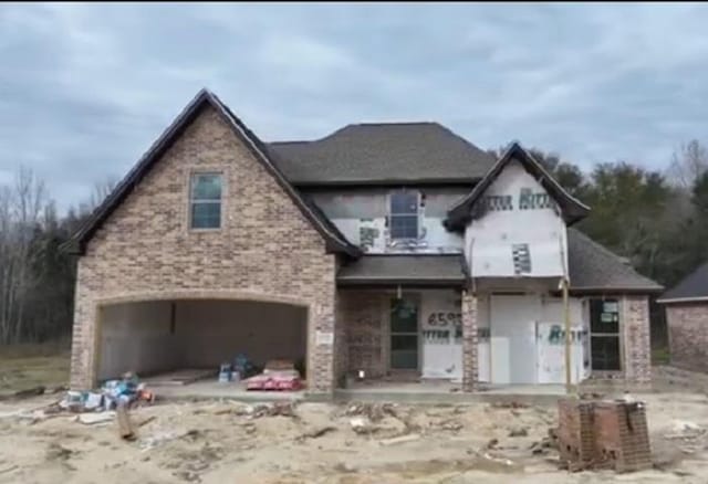 view of front of home with a garage