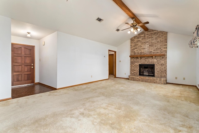 unfurnished living room featuring ceiling fan, carpet, a fireplace, and baseboards