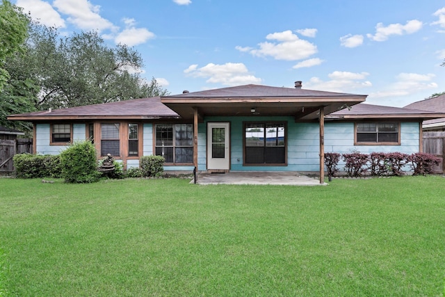 back of property with a patio area