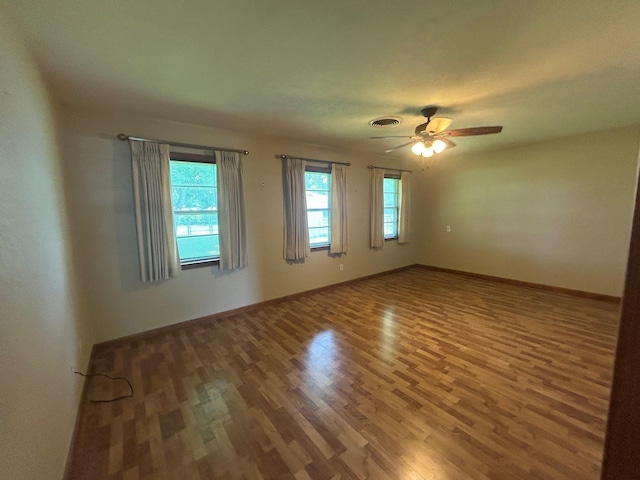 205 Turner Ln, Bridge City, TX 77611 - empty room featuring wood finished floors and a ceiling fan