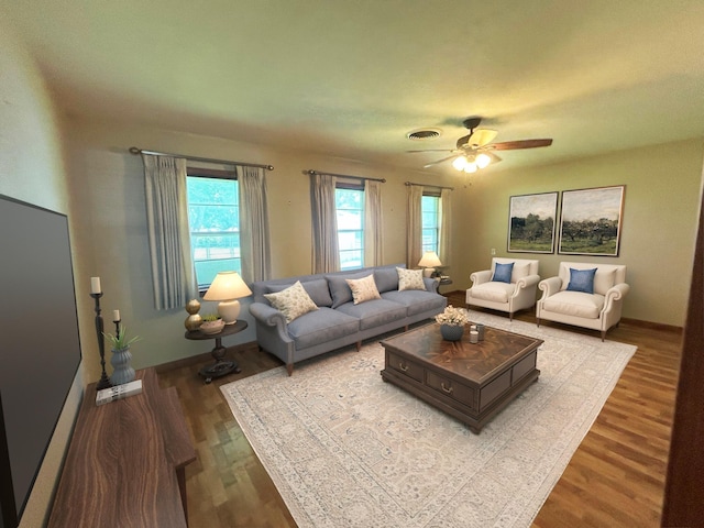 205 Turner Ln, Bridge City, TX 77611 - living area with wood finished floors and a ceiling fan