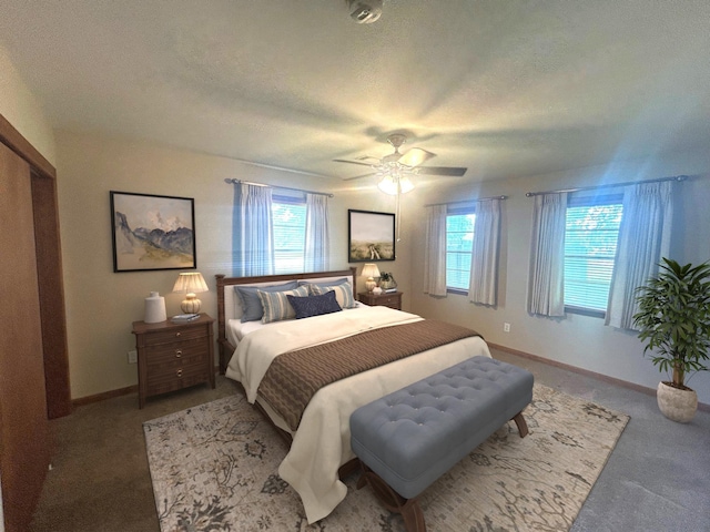 205 Turner Ln, Bridge City, TX 77611 - bedroom featuring multiple windows, carpet floors, a textured ceiling, and ceiling fan
