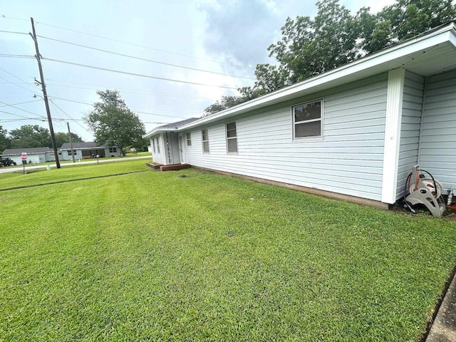 205 Turner Ln, Bridge City, TX 77611 - view of grassy yard