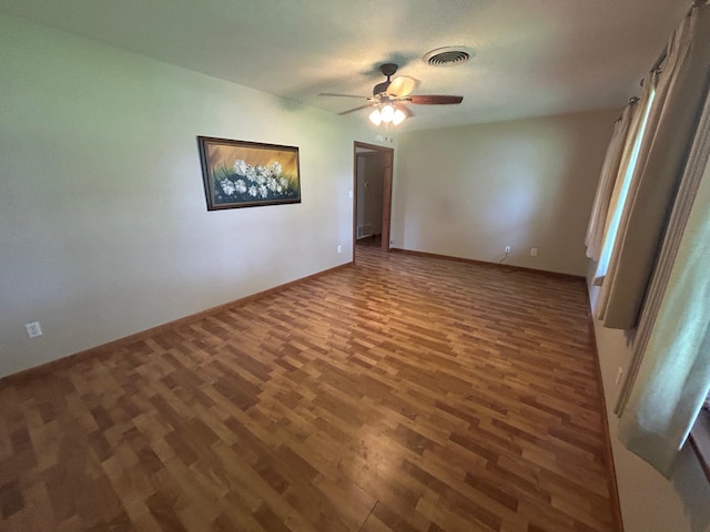 205 Turner Ln, Bridge City, TX 77611 - unfurnished room with wood finished floors and a ceiling fan