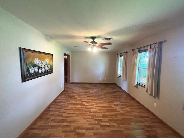 205 Turner Ln, Bridge City, TX 77611 - spare room with wood finished floors and ceiling fan