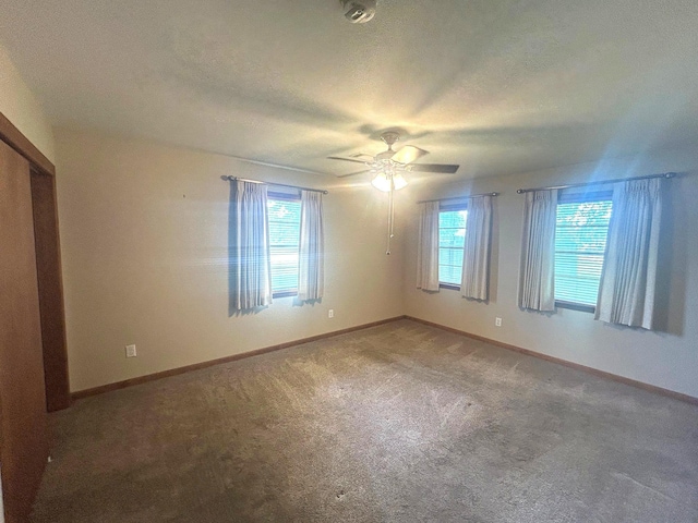 205 Turner Ln, Bridge City, TX 77611 - spare room with a ceiling fan and light colored carpet