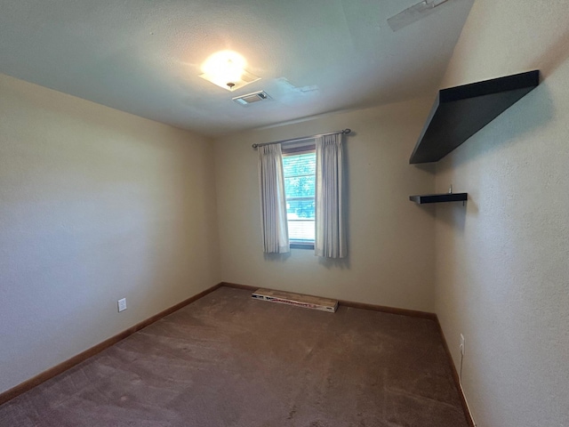 205 Turner Ln, Bridge City, TX 77611 - carpeted spare room featuring baseboards